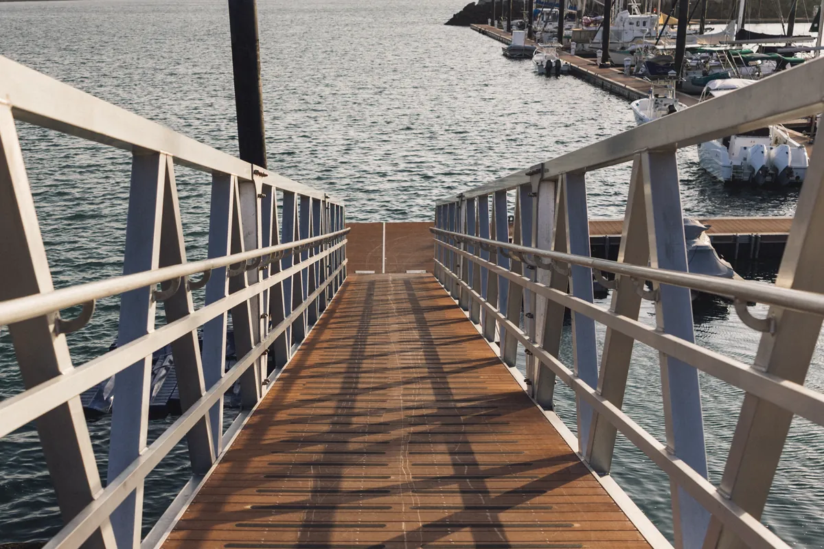 Gangway at Vista Mar Marina leading down to the boat slips and open water